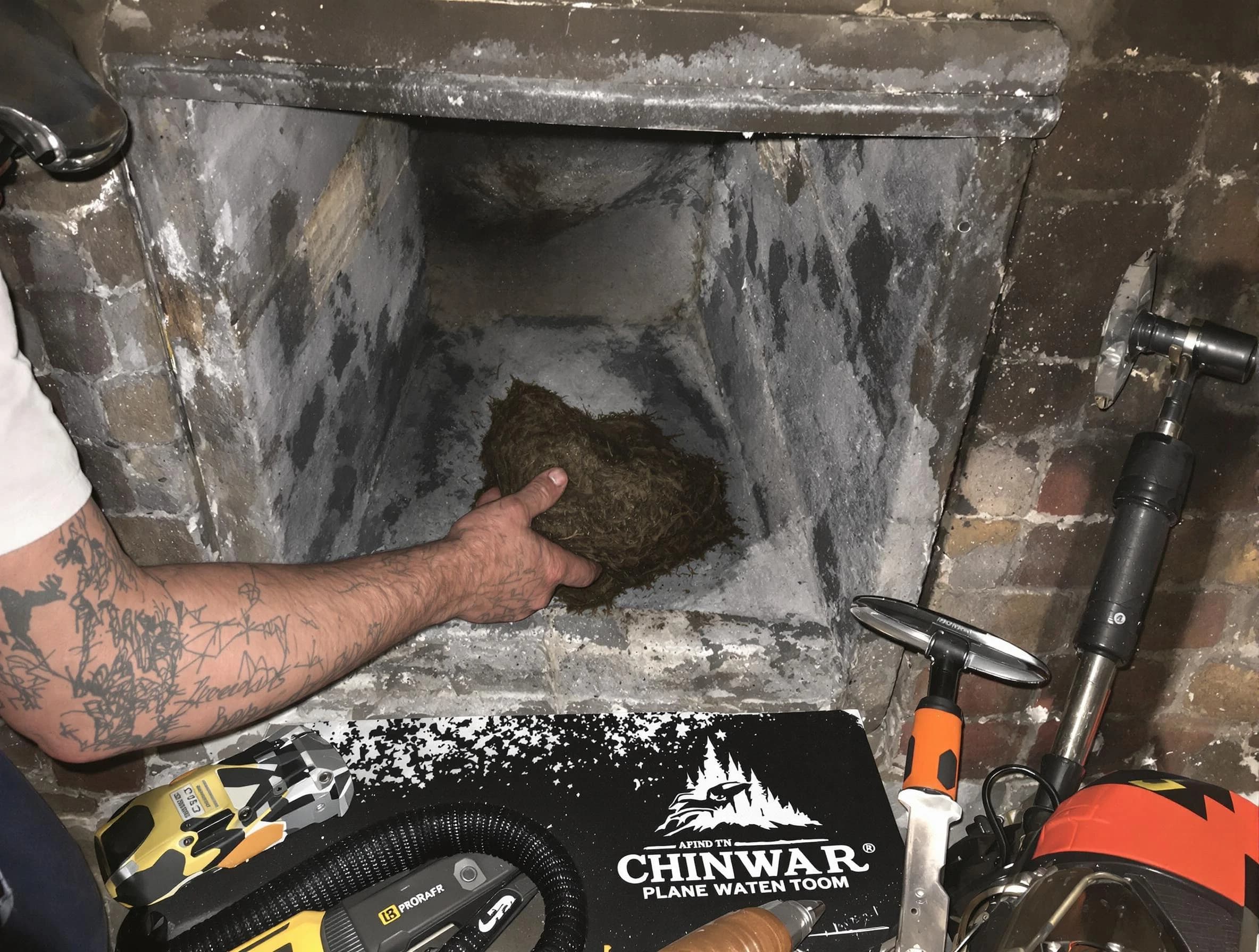 Salem Chimney Sweep safely removing debris and screening chimney in Salem, UT